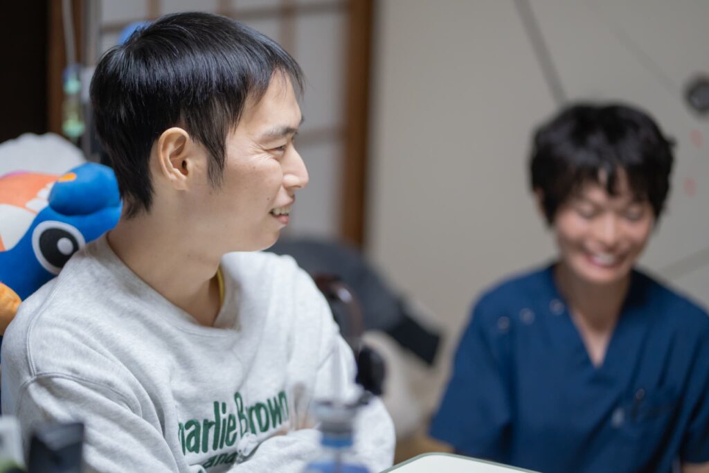 笑顔の男性患者